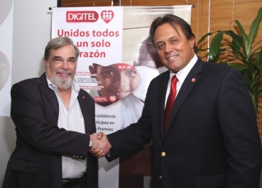 Charles Lazzari de Fe y Alegría y Juan Carlos Sánchez, VP de Mercadeo de Digitel